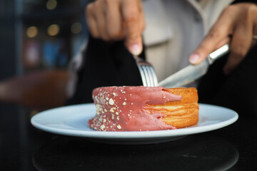 Enjoying a sweet treat at a cozy cafe with a friend