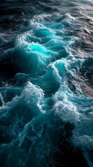 Powerful turquoise ocean waves with sea foam and sunlight reflections, symbolizing nature, strength, and motion. Perfect for travel, marine, wellness, and environmental backgrounds with copy space.