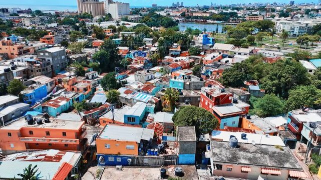 A tropical city urban life concept backdrop. On the deserted streets of the Dominican Republic's capital. Residential area on the outskirts of the city. A modern urban landscape in Latin America.
