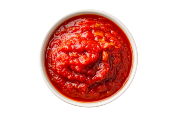 Close-up view of rich red tomato sauce in a white bowl on a transparent background, cut out