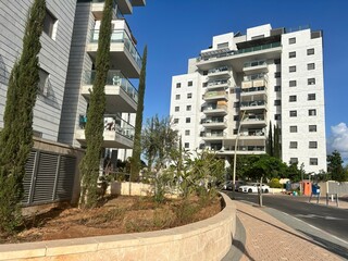 A modern residential area in Israel. New buildings, a cozy residential complex. Apartment buildings