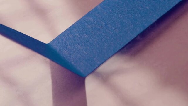 Close-up of Blue Washi Tape Being Peeled Off Glass Surface in 4K Ultra HD &mdash; Craft Material Adhesive Texture, Creative Design Concept, and Minimal Artistic Detail with Clean Background