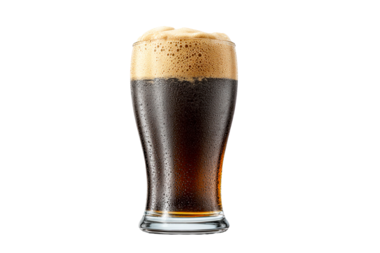Dark beer in frosted glass with foamy head on a transparent background, cut out