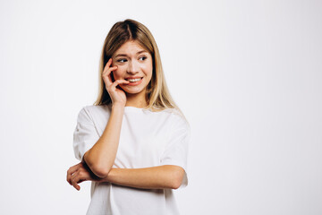 Fototapeta premium Young girl with emotions and gestures isolated on white background