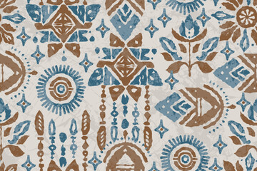Bohemian tribal seamless pattern featuring ethnic motifs in rustic blue and brown tones. ikat and handwoven textile art, tribal style with geometric and floral elements for a vintage handmade look.
