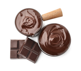 Melted chocolate and pieces isolated on white, top view