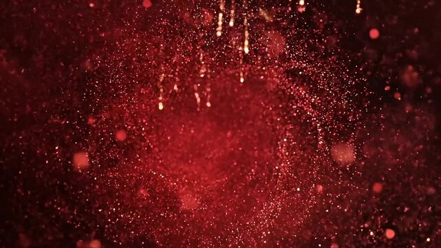 Fiery red abstract particles swirling in dark space with glowing highlights