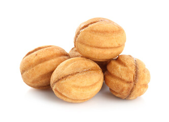 Delicious nut shaped cookies with boiled condensed milk isolated on white