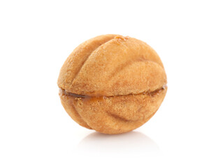 Delicious nut shaped cookie with boiled condensed milk isolated on white