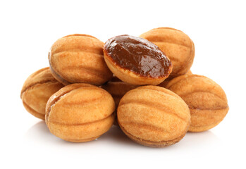 Delicious nut shaped cookies with boiled condensed milk isolated on white