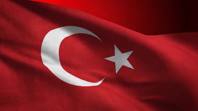 Waving Turkish flag with crescent moon and star against a red background, symbolizing national pride.