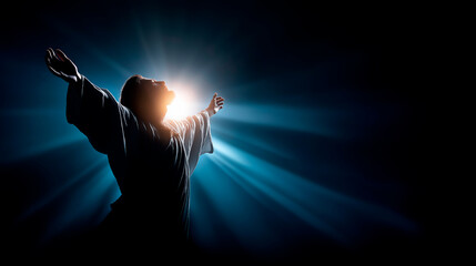 Dramatic silhouette of Jesus Christ standing in brilliant rays of divine supernatural light profound resurrection concept Easter powerful symbolism Christian faith and victory