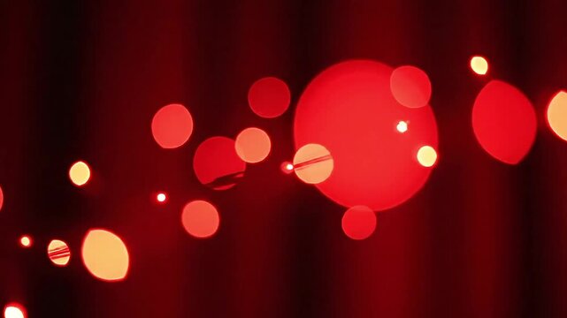 Magical red bokeh lights create a festive and warm atmosphere, perfect for celebrations.