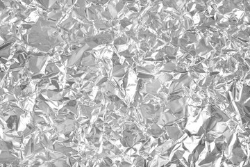 Silver foil leaf shiny texture, abstract grey wrapping paper for background and design art work.