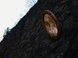 Decorative Mirror on Stone Wall Reflecting Nature