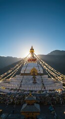 Scenic view of boudhanath stupa with prayer flags in kathmandu, nepal, at sunrise.