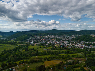 Aerial View of Lush Valley and Town