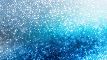 Obraz premium きらめく雪と光が舞う青いグラデーション背景