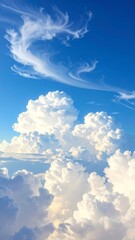Sunlit puffy white clouds against a deep blue sky.