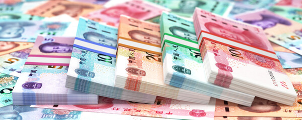 Chinese yuan banknotes arranged in neat stacks representing trade, business, and investment