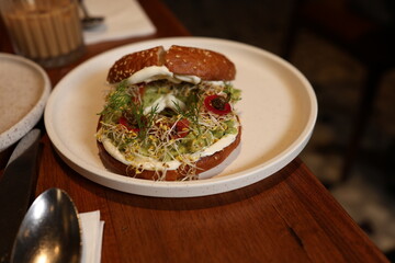 Avocado cream bagels for breakfast in a restaurant