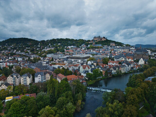 Aerial View of European Town with Castle and River
