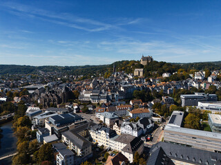 Aerial View of European City with Castle on Hill