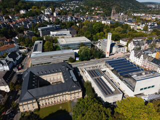 Aerial Cityscape with Solar Panels and Greenery