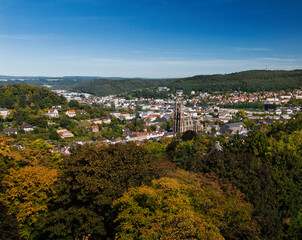 Aerial View of Town with Prominent Church and Lush Greenery