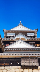 Fototapeta premium Matsuyama Castle – Historic Japanese Hilltop Fortress in Ehime, Japan