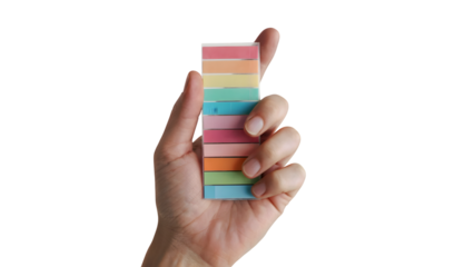 hand holding a stack of colourful sticky notes . Isolated on transparent background, png