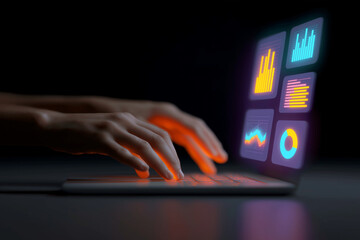 A person"s hands are typing on a laptop, with colorful data visualizations emerging from the screen in a dark environment, illustrating digital analytics.