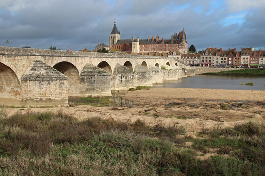 river loire, old bridge and castle in gien in france