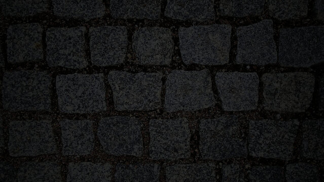 dunkler Hintergrund, altes Granitpflaster