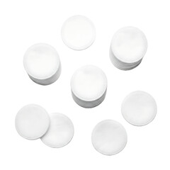 A neat arrangement of white, soft, and round cotton pads, featuring both stacked and individual pieces, presented on a clean background, ideal for cosmetic and hygienic applications