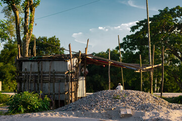 The Simplicity of a Village Store with a Natural Backdrop