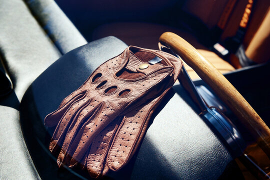 Car gloves on steering wheel