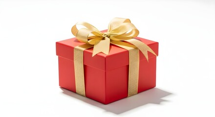 Obraz premium Red Christmas gift box with golden ribbon on a white background, soft shadows, studio lighting. Secret Santa.
