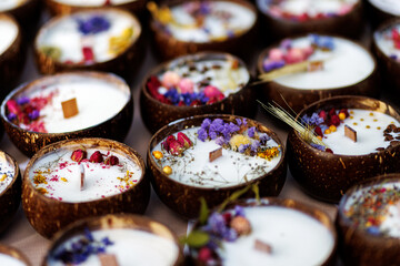Handmade soy candles decorated with dried flowers