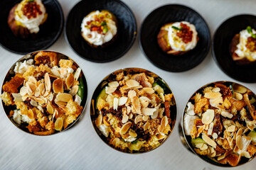 Gourmet dessert with almonds and figs served in small bowls