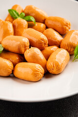 Sausage mini meat portion size fast food natural product tasty snack fresh delicious gourmet food background on table rustic top view copy space