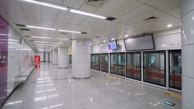 SEOUL, SOUTH KOREA - OCTOBER 11, 2025 - Empty subway station platform in Seoul, South Korea, with a train at the doors