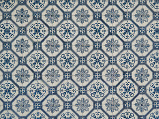 Seamless floral pattern of traditional Portuguese Azulejo tiles in blue and white, typical of Lisbon architecture, Portugal.