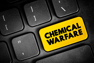 Fototapeta premium Chemical Warfare - using the toxic properties of chemical substances as weapons, text button on keyboard, concept background
