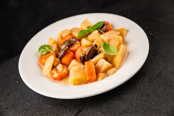 Potato stew mushrooms and vegetables natural tasty snack fresh delicious gourmet food background on the table rustic top view copy space keto and paleo diet vegerian and vegan food