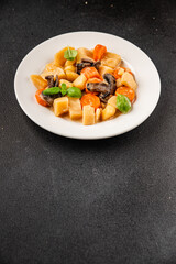Potato stew mushrooms and vegetables natural tasty snack fresh delicious gourmet food background on the table rustic top view copy space keto and paleo diet vegerian and vegan food