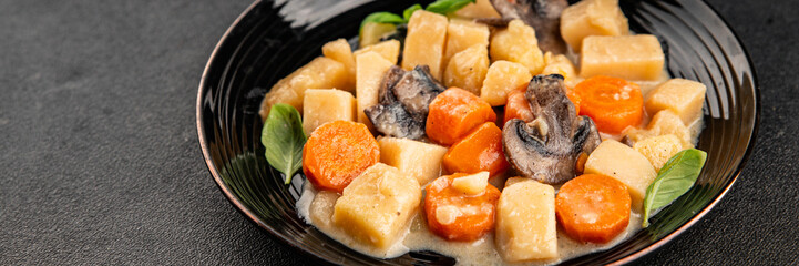 Potato stew mushrooms and vegetables natural tasty snack fresh delicious gourmet food background on the table rustic top view copy space keto and paleo diet vegerian and vegan food