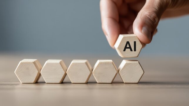 Hand placing ai block to complete the word on table
