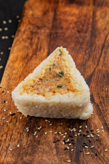 Onigiri sushi tuna stuffing Japanese food natural tasty snack fresh delicious gourmet food background on the table rustic top view copy space