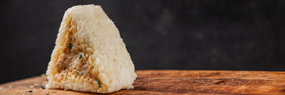 Onigiri sushi tuna stuffing Japanese food natural tasty snack fresh delicious gourmet food background on the table rustic top view copy space